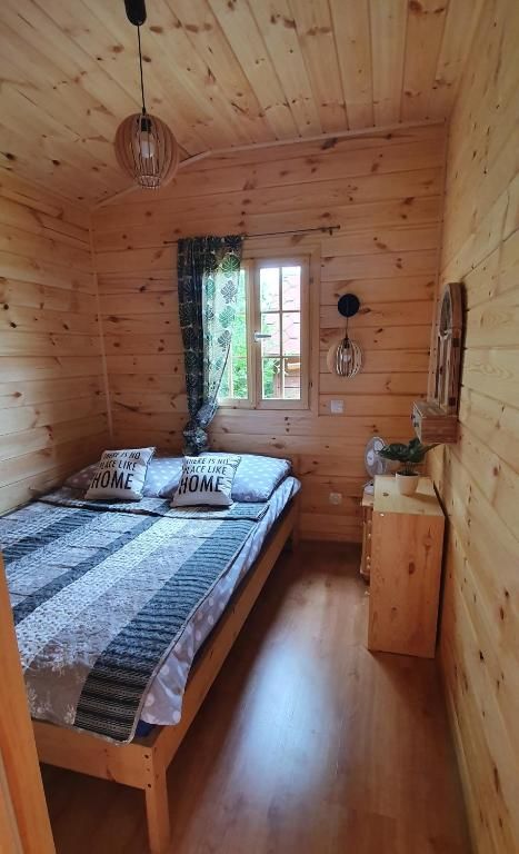 Дома для отпуска Domek drewniany nad jeziorem Zełwągi-19