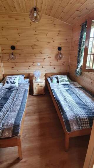 Дома для отпуска Domek drewniany nad jeziorem Zełwągi Дом с 2 спальнями-17