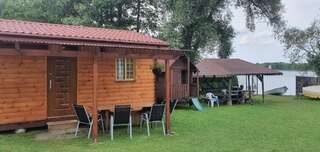 Дома для отпуска Domek drewniany nad jeziorem Zełwągi Дом с 2 спальнями-21